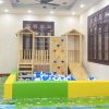 Cầu trượt liên hoàn gỗ trong nhà kèm vách leo núi cho bé TPG2-004